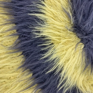 Primer plano macro de la textura de piel sintética con rayas de punto azul y amarillo