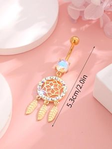 Detail of golden dreamcatcher belly ring with zircon stones and leaf pendants, 5.3cm long