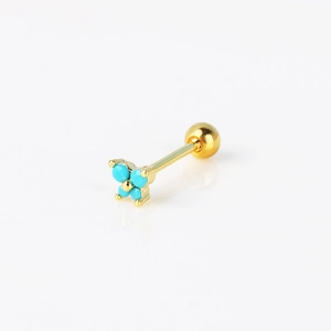 Close-up of golden stainless steel ear stud with turquoise blue flower and ball back