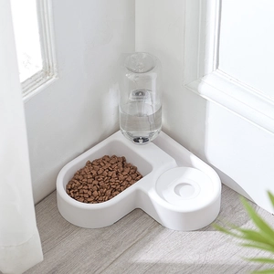 L-shaped white pet feeder station with automatic water dispenser and dry food bowl