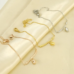 Minimalist 18K gold plated rose bracelet with bell charms in three metallic colors