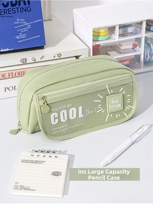 Detail view of large capacity light green canvas pencil case with multi-layer zippers