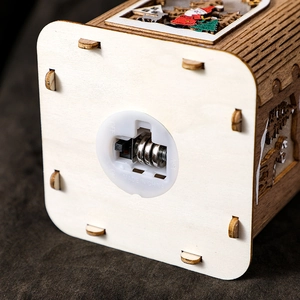 Christmas wooden house decoration bottom view with battery compartment and power switch