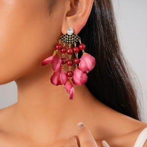 Vintage style long fringe earrings with rhinestones, red beads, and pink fabric petals