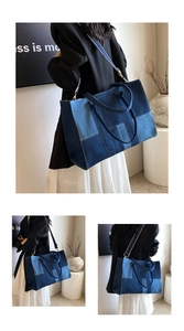 Macro shot of patchwork denim tote bag with wide strap and sturdy handles detail