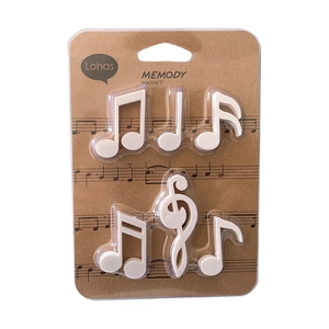 Set of 6 white musical note fridge magnets in creative piano sheet music packaging