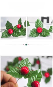 Detailed view of artificial holly berries with green leaves and wire stems for Christmas