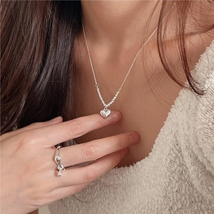Minimalist 925 silver heart pendant necklace and irregular lava style ring set on model