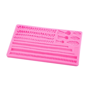 Pink silicone mold featuring knitted rope and fringe textures for fondant cake decorating