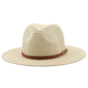 Classic Panama hat in beige straw with a slim brown leather belt and metal studs detail