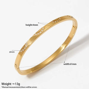 Elegant gold wave stainless steel bracelet with zircon stones and 61mm inner diameter