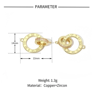 Macro detail of gold-plated copper pendant with Roman numerals and cubic zirconia stones