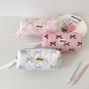 Quilted bow stationery pouches in pink and white with Hisocute label for school and makeup
