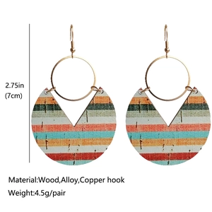 Bohemian blue striped wood earrings with hollow circular design and golden metal accents