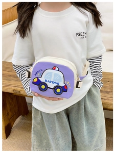 Detail of cartoon car kid's crossbody bag with adjustable strap and buckle closure