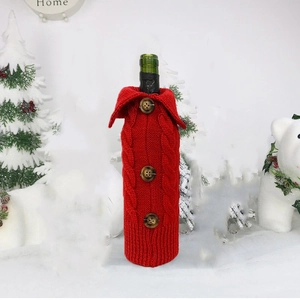 Knitted Christmas wine bottle cover in red sweater style with buttons for home decor