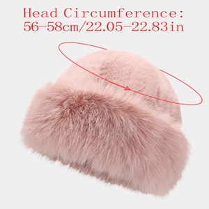 Detail of pink faux fur bucket hat showing 56-58cm head circumference measurements