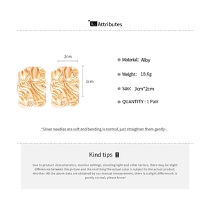 Detailed specs of geometric crinkled alloy earrings with silver needles and 3x2cm size