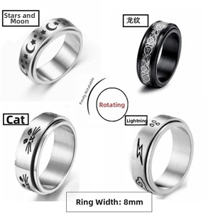 Detail of four 8mm spinner rings featuring star, moon, dragon, cat and lightning designs