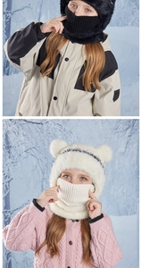 Close-up of children winter knit hat with bear ears and matching fleece neck warmer face mask