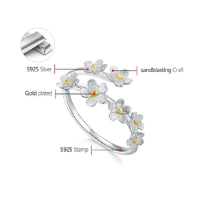 Detail of S925 sterling silver ring showing sandblasting craft and gold plating