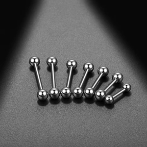 Detailed macro view of seven polished silver barbell tongue rings in various lengths