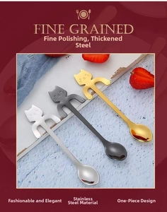 Three-piece cat-shaped stainless steel spoons in silver, gold, and black finishes