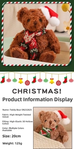Detail of 20cm plush Christmas teddy bear with festive scarf and soft velvet fabric