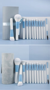 Macro view of 13-piece blue makeup brush set with synthetic bristles and gray storage bag