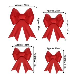 Four sizes of red PVC Christmas bows for festive holiday party decorations and ornaments