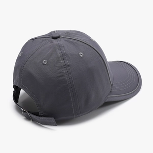 Dark grey baseball cap with wide brim and adjustable metal strap in a 45-degree back view