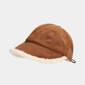 Detail of warm brown corduroy winter hat with soft sherpa fleece lining and ear flaps