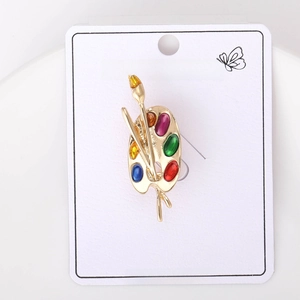Artistic palette brooch with colorful enamel paints and golden paintbrushes detail