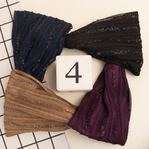 Set of four elastic knit headbands with metallic glitter finish in various colors