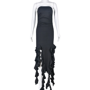 Detail of waist cut-out and layered ruffle fishtail hem on black bodycon maxi dress