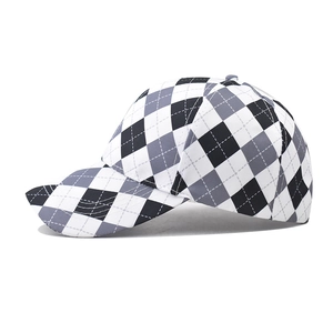 Classic diamond pattern baseball cap with a black, white and grey geometric plaid design