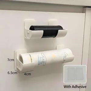 Wall-mounted white storage rack for trash bags and paper rolls with adhesive backing