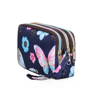 Sac pochette zippé multicouche en tissu avec motif papillon pour femmes au quotidien.