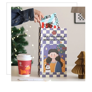 Detailed close-up of a festive Christmas gift bag with a purple checkerboard pattern