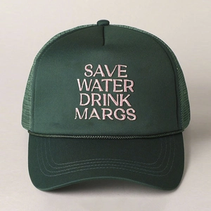 Close-up of pink embroidered text and decorative rope on a green mesh trucker hat
