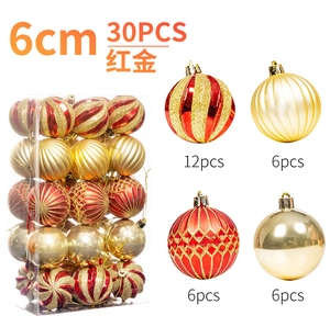 Detail view of 30-piece 6cm Christmas ball set with red and gold glitter patterns