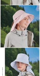 Detailansicht der pinken und weißen Outdoor-Sonnenhüte mit Nackenschutz und verstellbarer Kordel