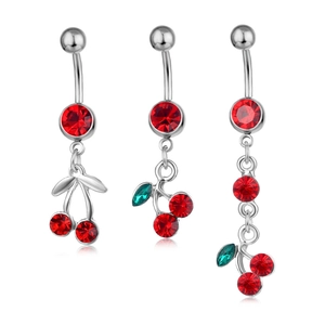 Three silver belly rings featuring red cherry charms and green crystal leaves on white