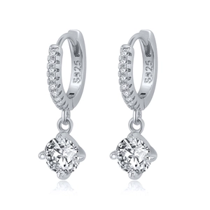 Macro shot of S925 sterling silver hoop earrings with clear round cubic zirconia stones