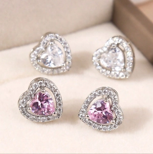 Sparkling copper heart studs with clear and pink zircon stones in silver finish