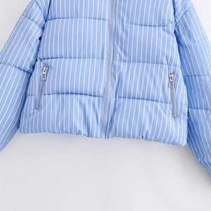 Short puffer jacket with blue and white vertical stripes and metal zipper details