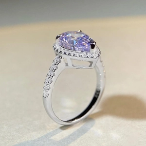 Elegant S925 sterling silver ring with pear-shaped lavender gemstone and side stones