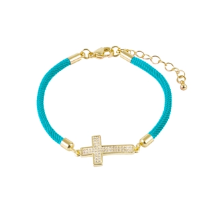 Detail of turquoise braided rope bracelet with gold cross charm set with sparkling zircons