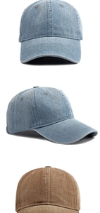 Detail of vintage washed denim baseball caps showing fabric texture and fine stitching