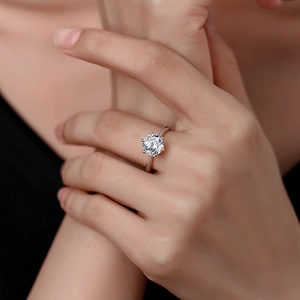 S925 silver 2 carat D color moissanite ring with classic six-prong setting on a model hand